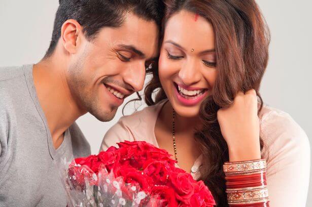 Couple-with-a-bouquet-of-flowers