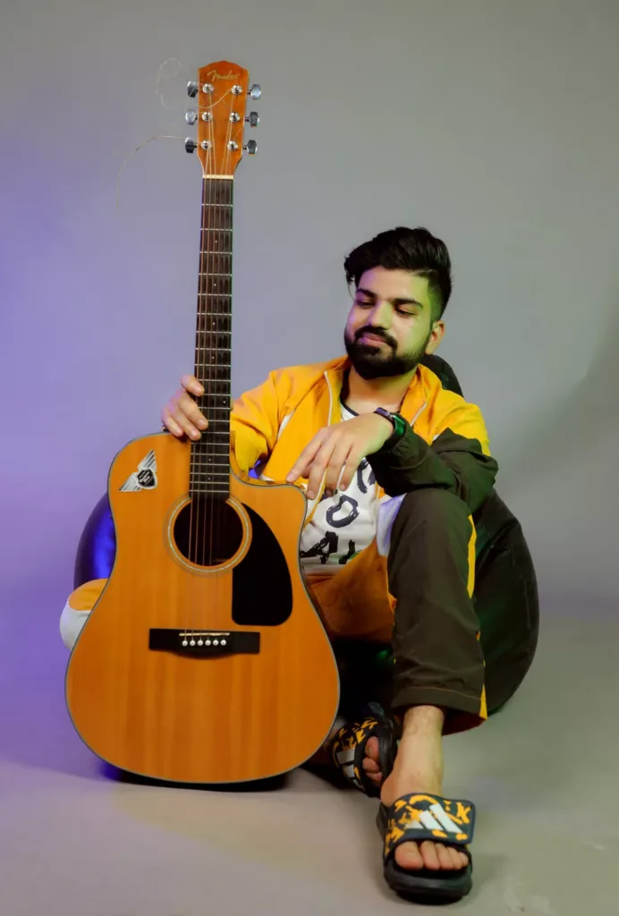 Shubh Sahota with guitar